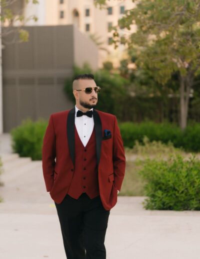 Custom tuxedo with contrast lapels and functional cuffs, tailored in Dubai.