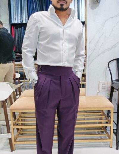 Bespoke blue dress shirt with a cutaway collar, tailored in Dubai.